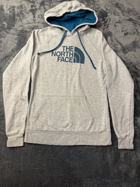 The North Face Light Gray Hoodie with Blue Logo and Lined Hood